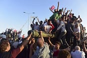 supporters-of-tukish-president-tayyip-erdogan-celebrate-after-soldiers-involved-in-the-coup-surrendered-on-the-bosphorus-bridge-in-istanbul-turkey-july-16-2016-reuters-yagiz-karahan